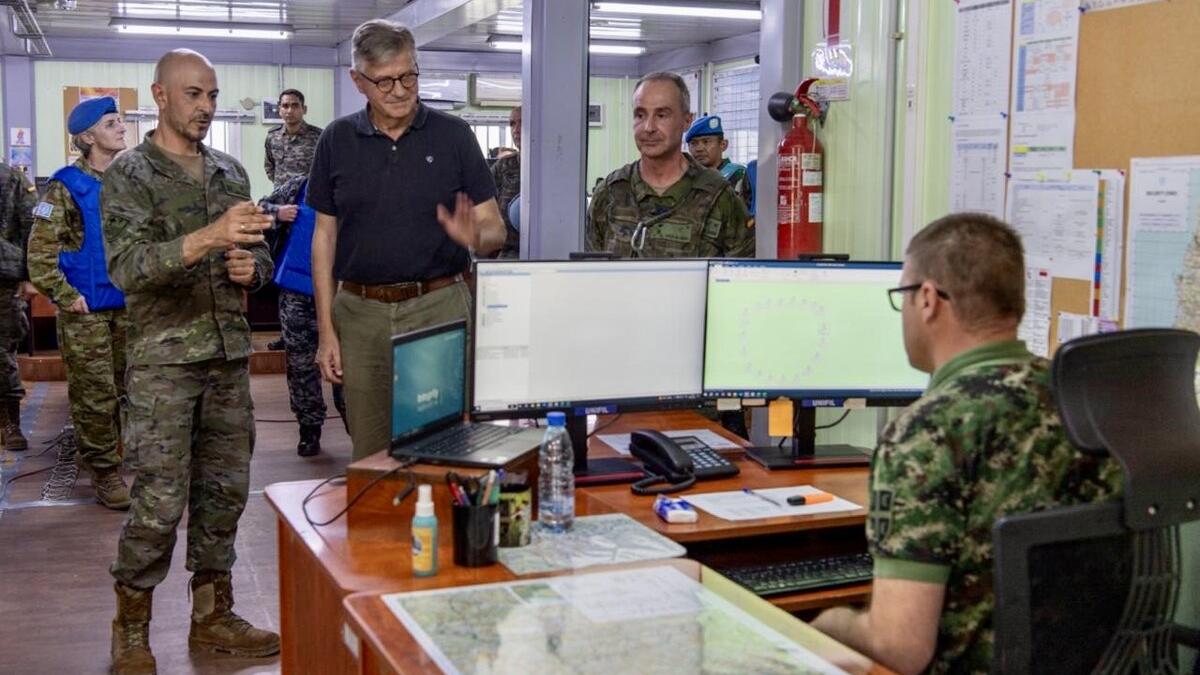 Jean-Pierre Lacroix converses with peacekeepers.