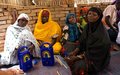 MINURCAT Quick Impact Project delivers radios to Refugees, IDPs and local women