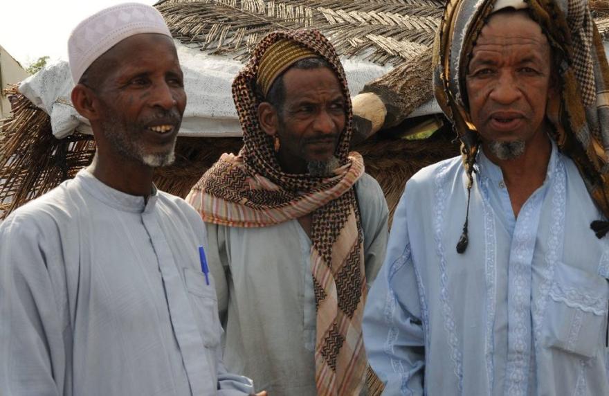 Three men in traditional dress